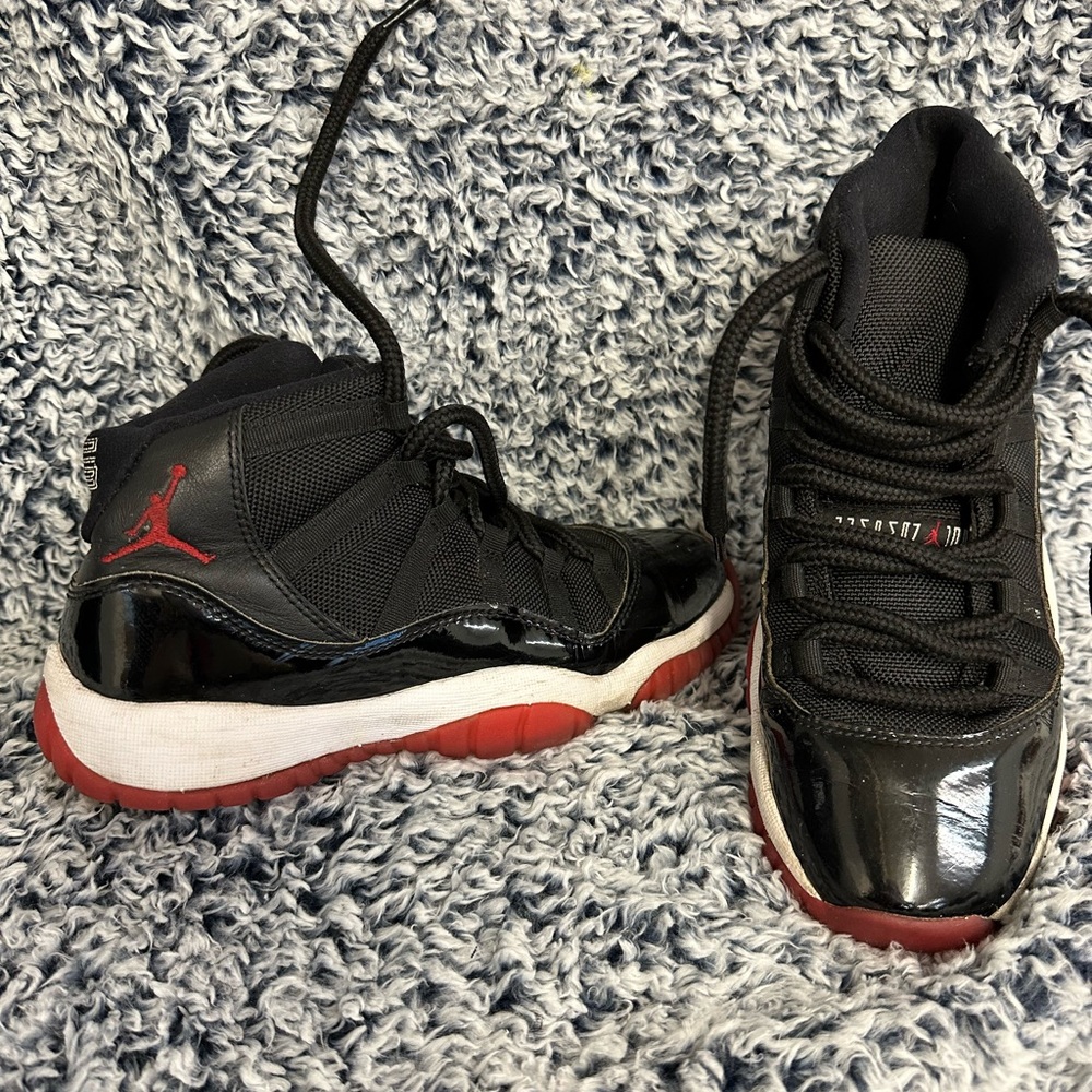 Black and red Jordan’s. Youth 6